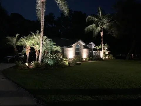 Landscape Lighting A well-lit landscape can add beauty and security to your home. This picture shows an example of landscape lighting that has been installed around a house.